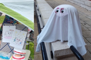 One of the Denticle sculptures covered in a sheet for Halloween
